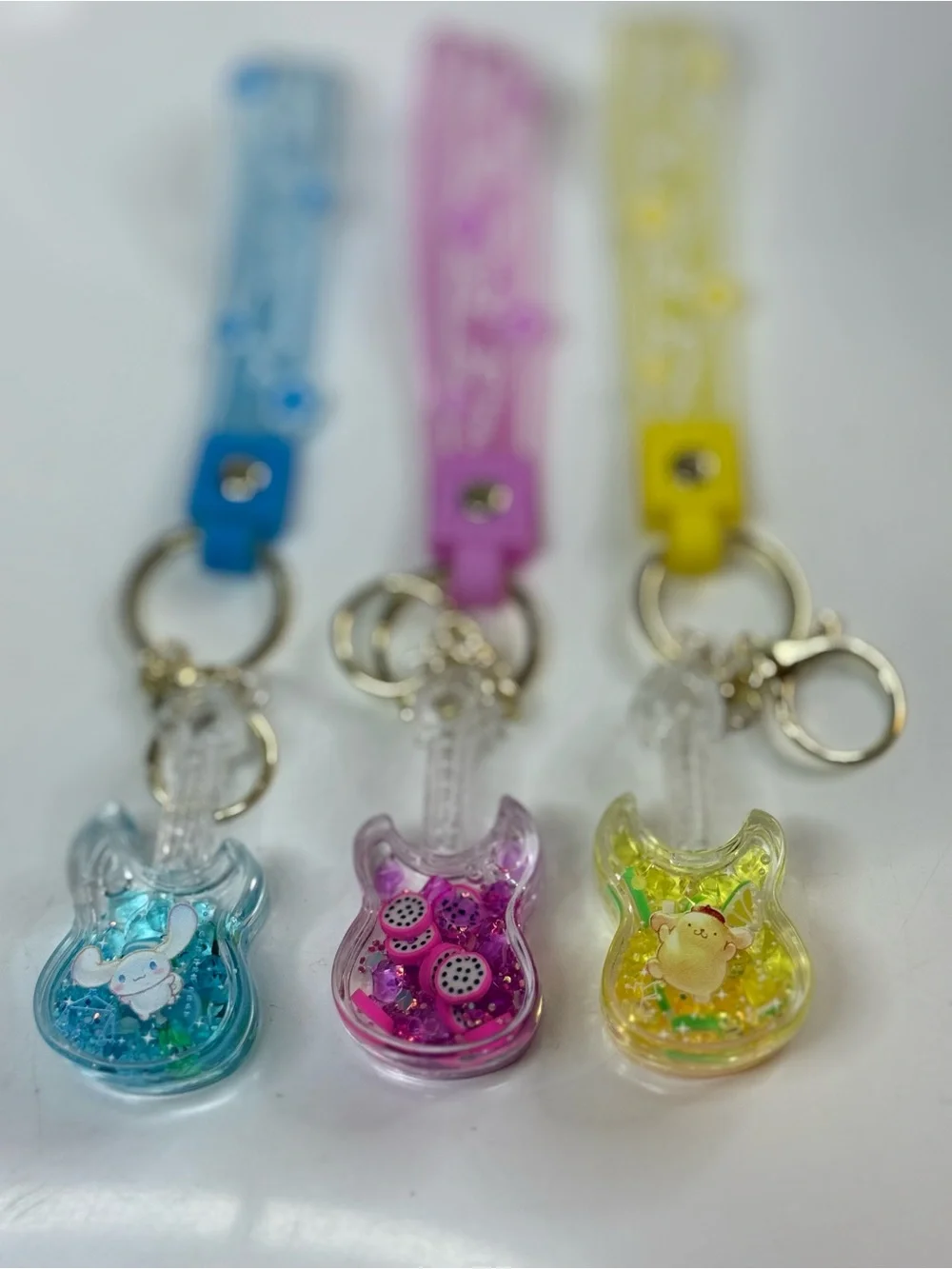 Sanrio Key & Card Holder Trio in Blue, Pink, and Yellow